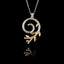 a silver spiral olive branch pendant on a chain, featuring a rhodium-plated stem and gold-plated leaves.