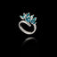 Angled view of an adjustable 925 sterling silver ring featuring a cluster of five flowers with bright turquoise enamel petals.