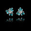 Front view of silver flower stud earrings with layered petals and vibrant turquoise enamel detailing.
