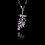 Handcrafted 925 sterling silver lavender sprig pendant with oxidised silver stem and clusters of purple enamel petals arranged in four tiers, hanging on a silver chain against a black background.