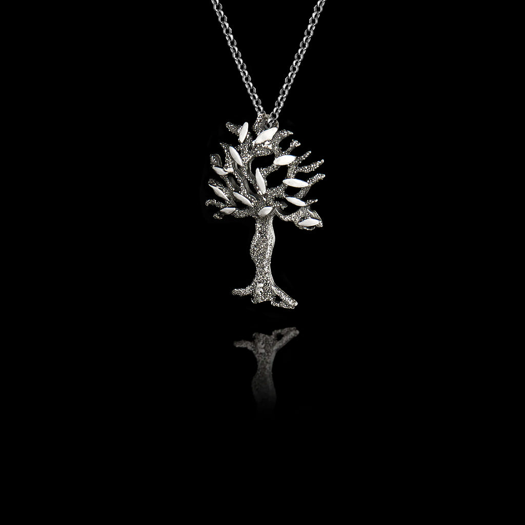 Perspective view of a Silver olive tree pendant on a chain against a black background