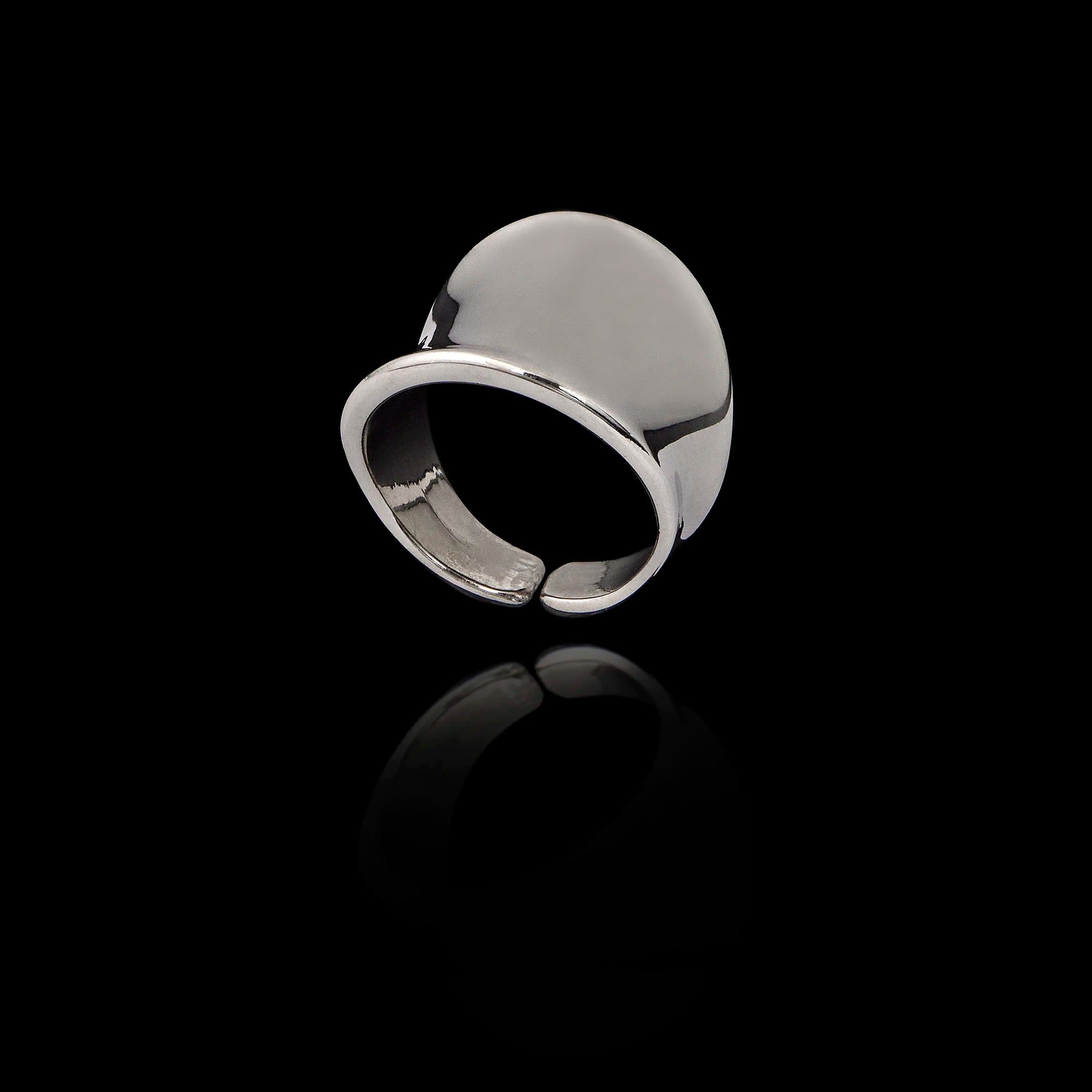 Silver ring on a black background