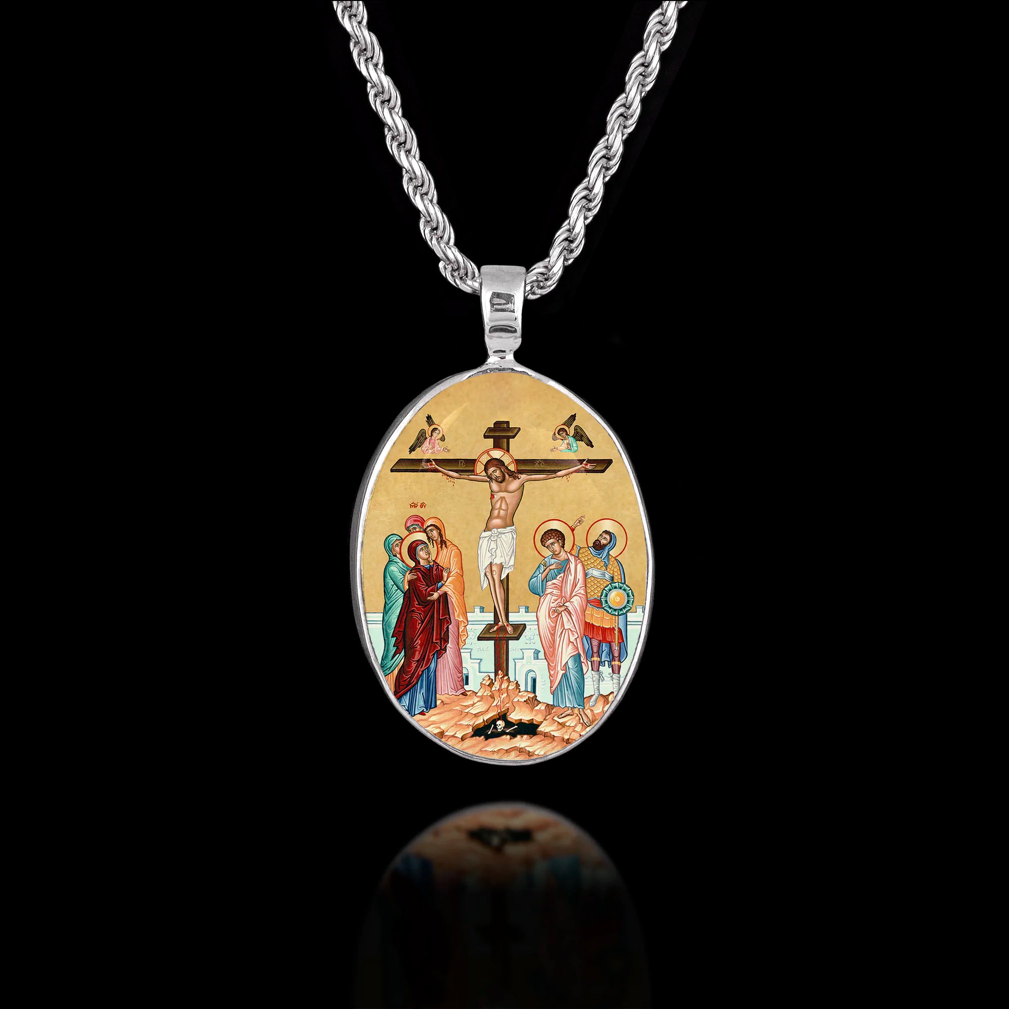 Oval 925 sterling silver pendant featuring a Byzantine icon of the Crucifixion of Jesus with Mary, John, and the skull of Adam. Main image