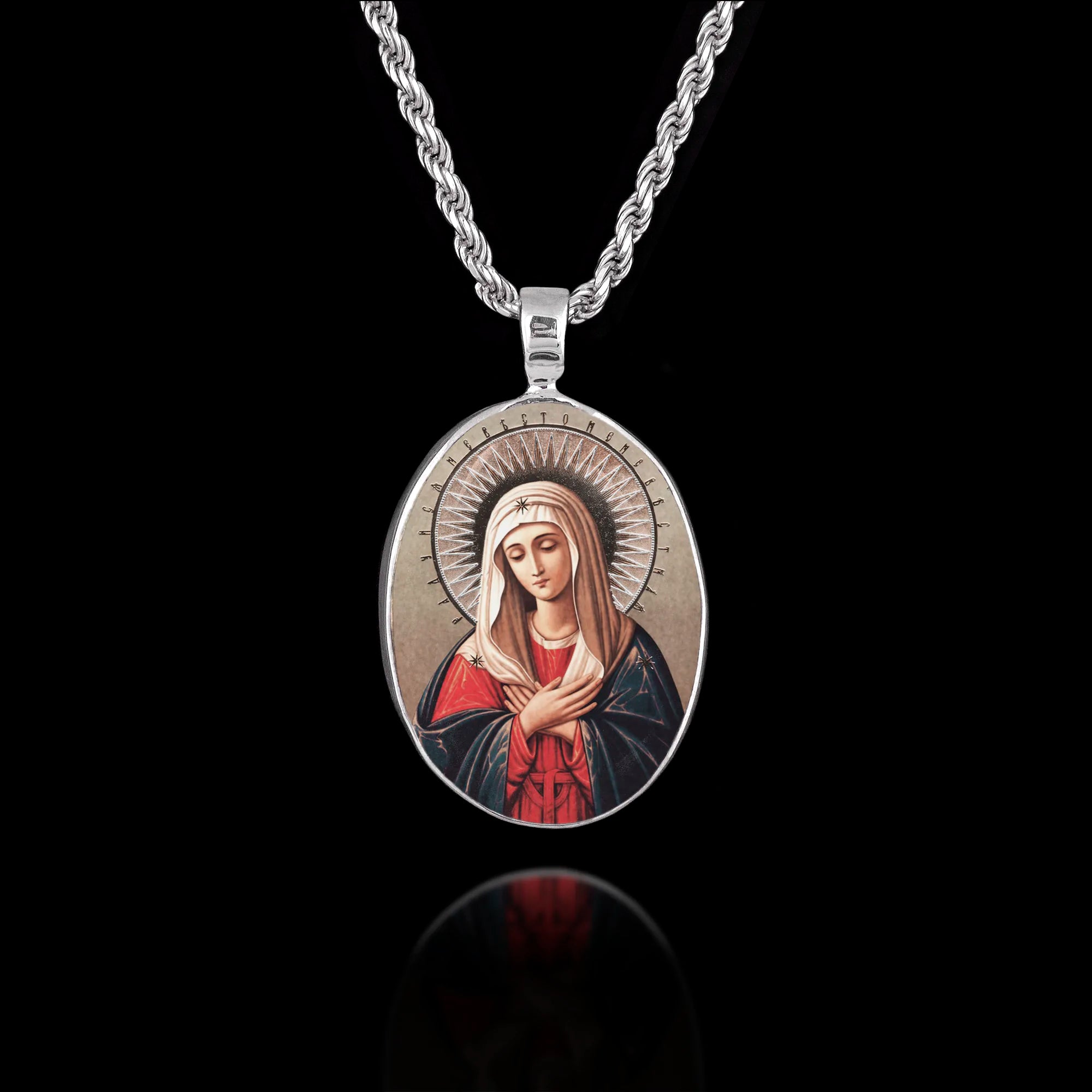 Oval 925 sterling silver pendant featuring the "Tenderness" (Umilenie) icon of the Virgin Mary with hands crossed and a halo.