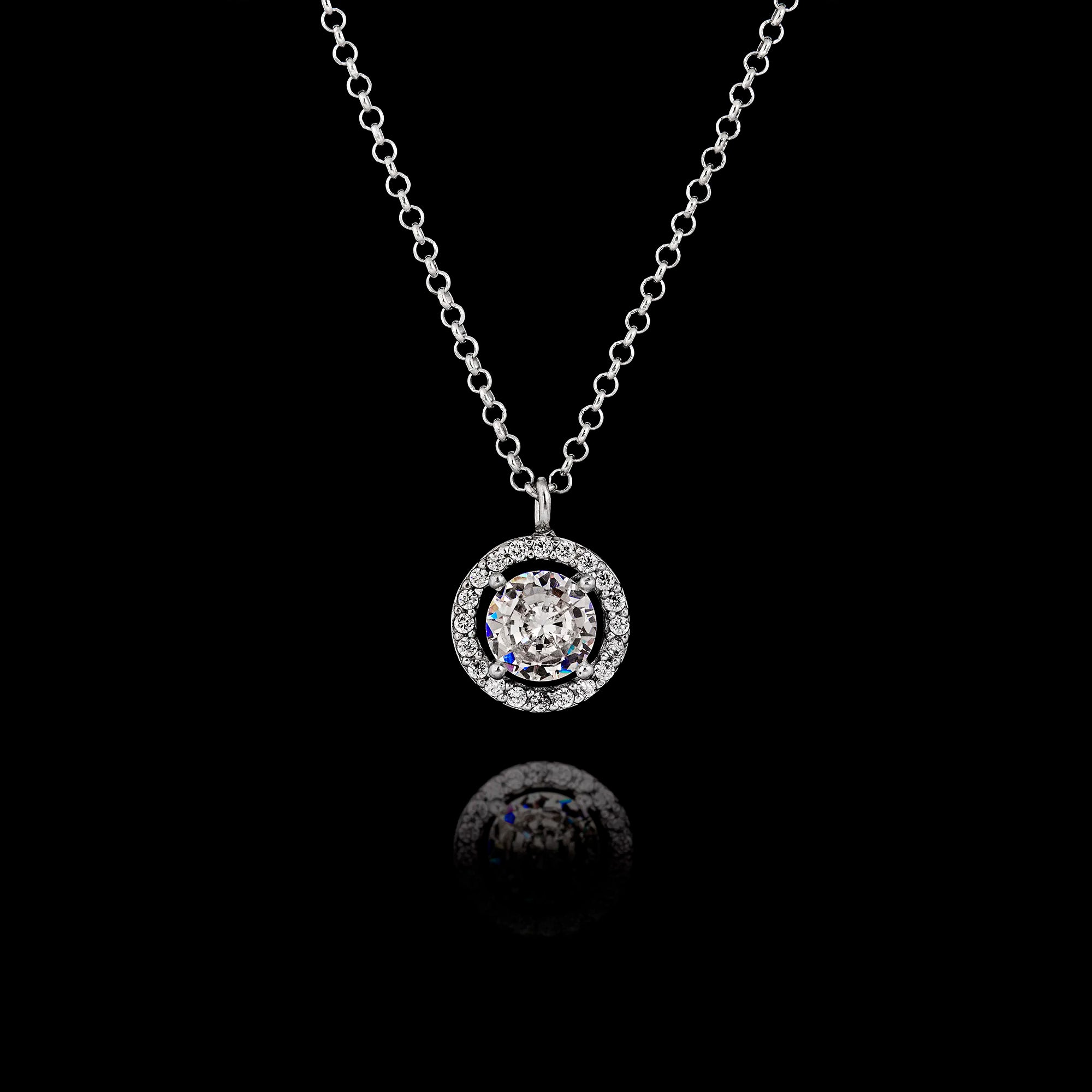 925 sterling silver pendant necklace featuring a round 6mm Swarovski crystal surrounded by a halo of smaller zircon crystals on an adjustable silver chain.
