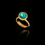 Gold plated 925 sterling silver adjustable ring featuring a round faceted synthetic aquamarine gemstone in a bezel setting.