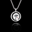 Round 925 sterling silver pendant featuring a Japanese ink wash painting of a pine tree inside an Enso circle.
