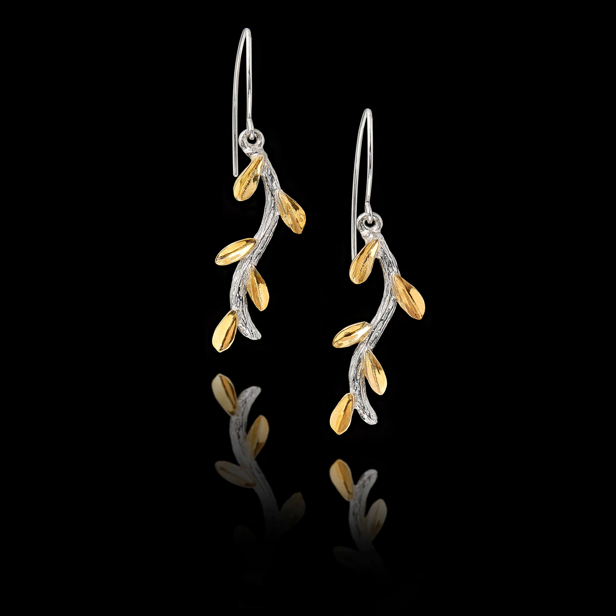 Long drop earrings in the shape of an olive tree branch, featuring a rhodium-plated silver stem and multiple small gold-plated leaves. Main image