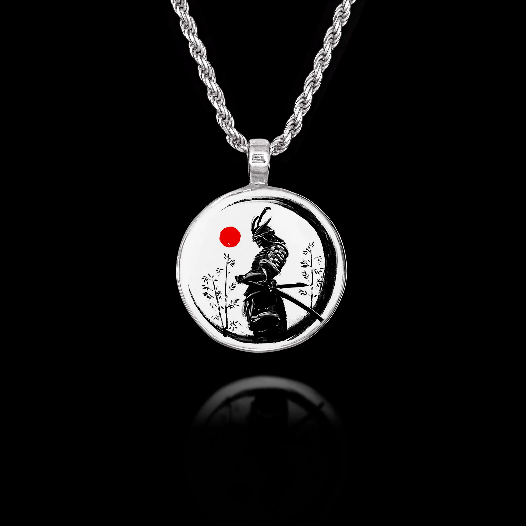 Round 925 sterling silver pendant featuring a black silhouette of a Samurai warrior with a red sun and bamboo.