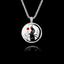 Round 925 sterling silver pendant featuring a black silhouette of a Samurai warrior with a red sun and bamboo.
