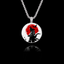 Round 925 sterling silver pendant featuring a black samurai silhouette against a large red brushstroke sun with birds.