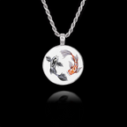Round 925 sterling silver pendant featuring two Koi fish (one black, one orange) swimming in a yin-yang circle.