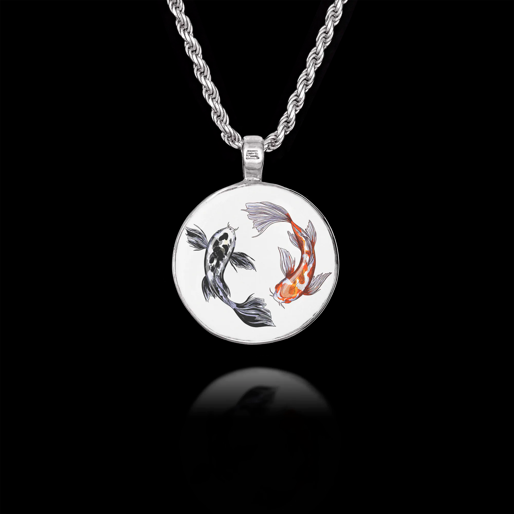 Round 925 sterling silver pendant featuring two Koi fish (one black, one orange) swimming in a yin-yang circle.