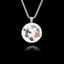 Round 925 sterling silver pendant featuring two Koi fish (one black, one orange) swimming in a yin-yang circle.