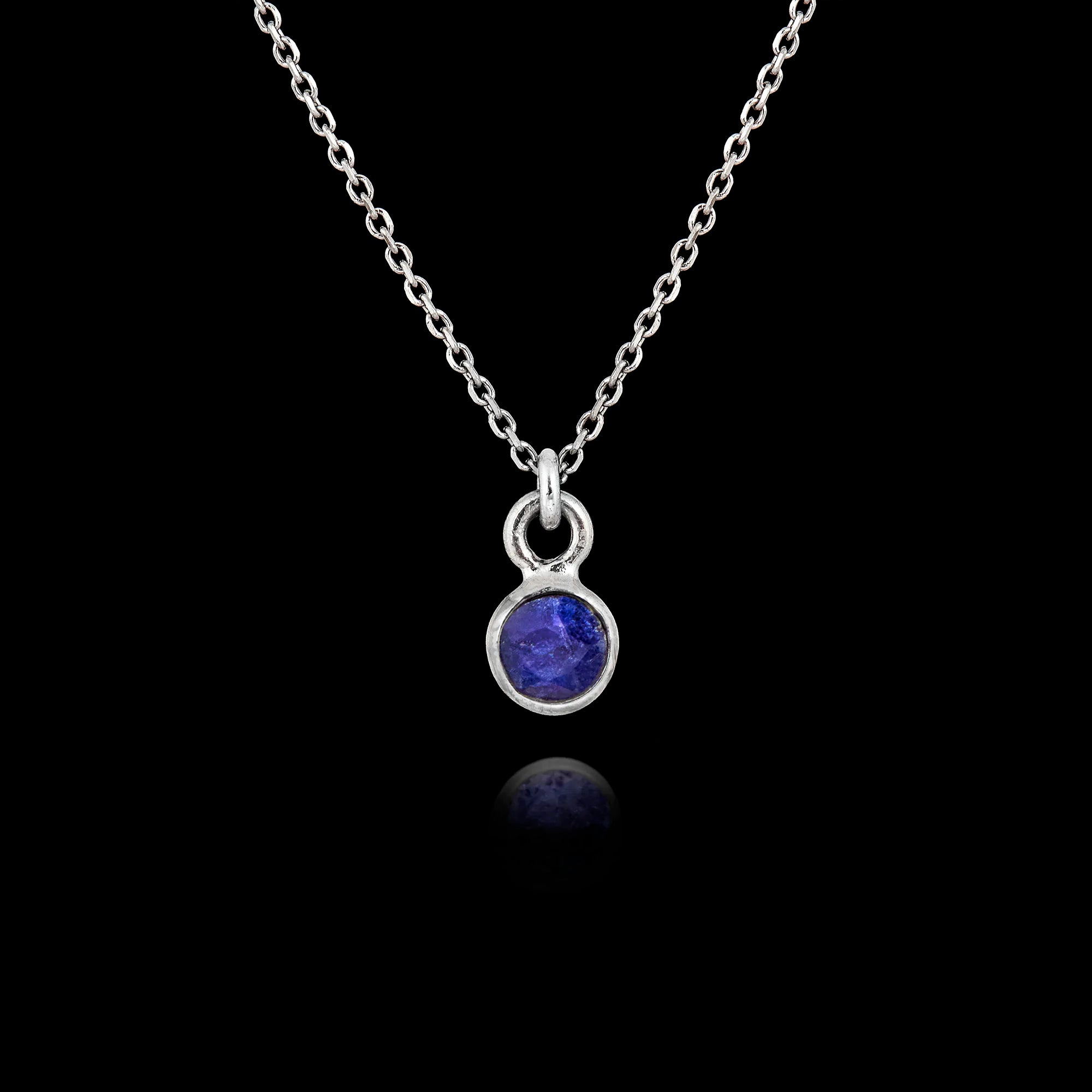 925 sterling silver pendant necklace featuring a round 5mm lapis lazuli gemstone on an adjustable silver chain. Main image