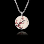 Round 925 sterling silver pendant featuring a Japanese painting of red plum blossoms on a branch with calligraphy.