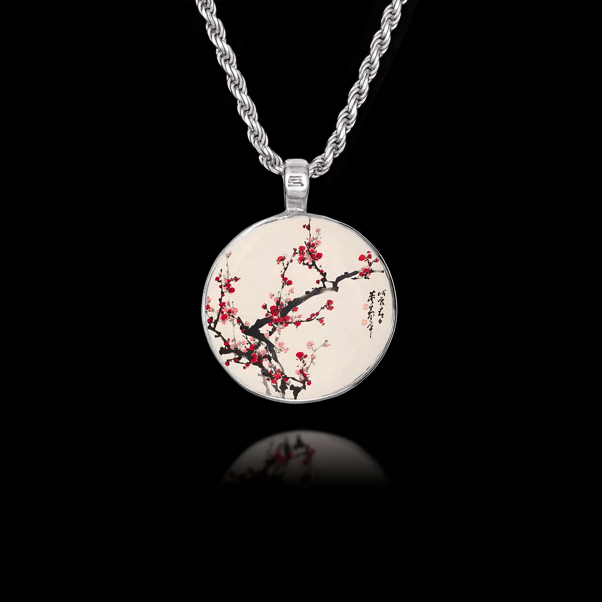 Round 925 sterling silver pendant featuring a Japanese painting of red plum blossoms on a branch with calligraphy.