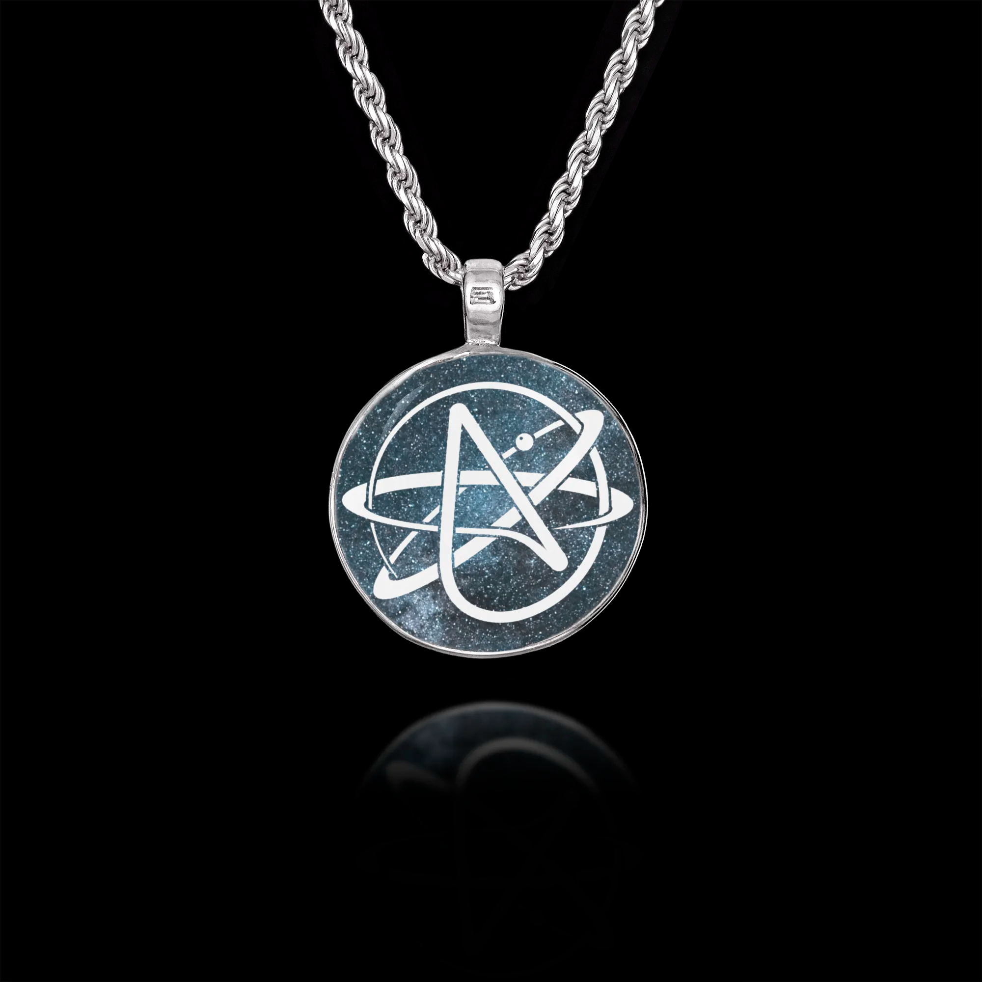 Round 925 sterling silver pendant featuring the white Atheist Atomic symbol set against a deep blue starry galaxy background.