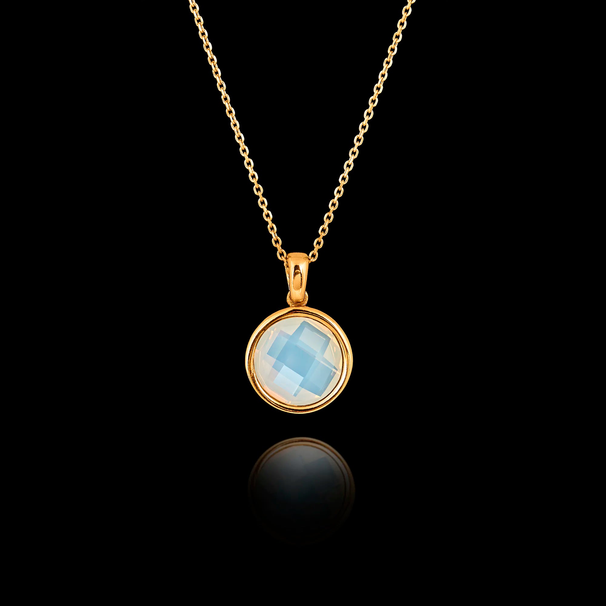 Gold plated 925 sterling silver pendant necklace featuring a round 1cm faceted semi-translucent white synthetic gemstone on an adjustable chain. Main image