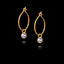 Gold hoop earrings with moonstone gemstones on a black background