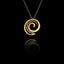 Handcrafted 925 sterling silver spiral pendant featuring a ridged gold-plated outer coil and oxidised silver inner curl, hanging on a silver chain against a black background.