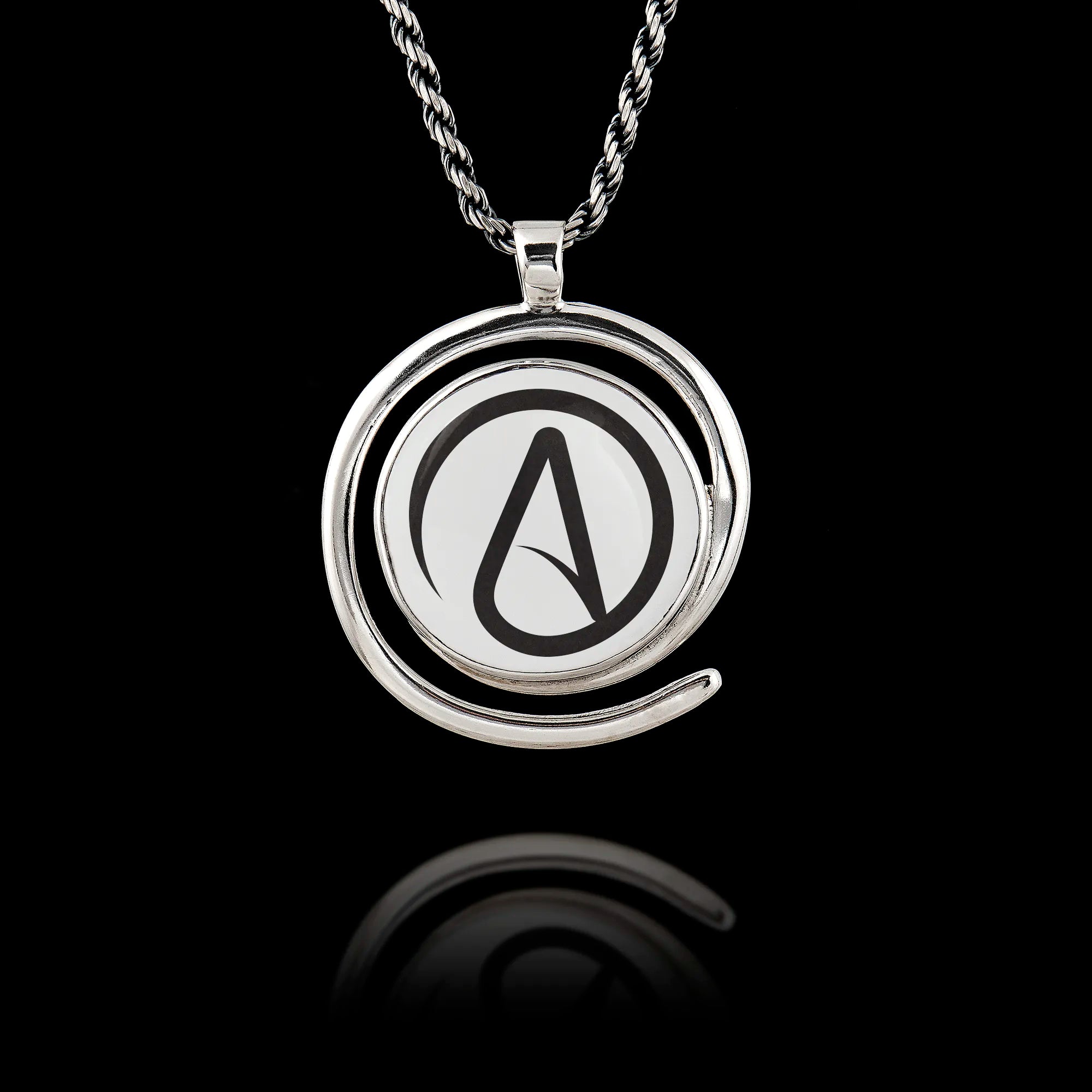 Round 925 sterling silver pendant with a spiral frame featuring the black Atheist "A" symbol on a white background.