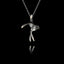 Handcrafted 925 sterling silver swallow pendant with oxidised finish showing the bird with outstretched wings and forked tail in a mid-flight pose, hanging on a silver chain against a black background.
