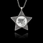 925 sterling silver five-pointed star pendant featuring a round ceramic insert with the Egyptian Eye of Ra symbol.