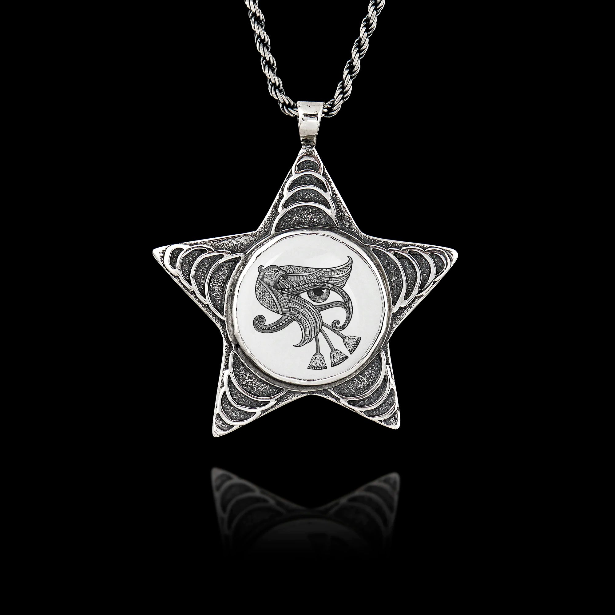 925 sterling silver five-pointed star pendant featuring a round ceramic insert with the Egyptian Eye of Ra symbol.
