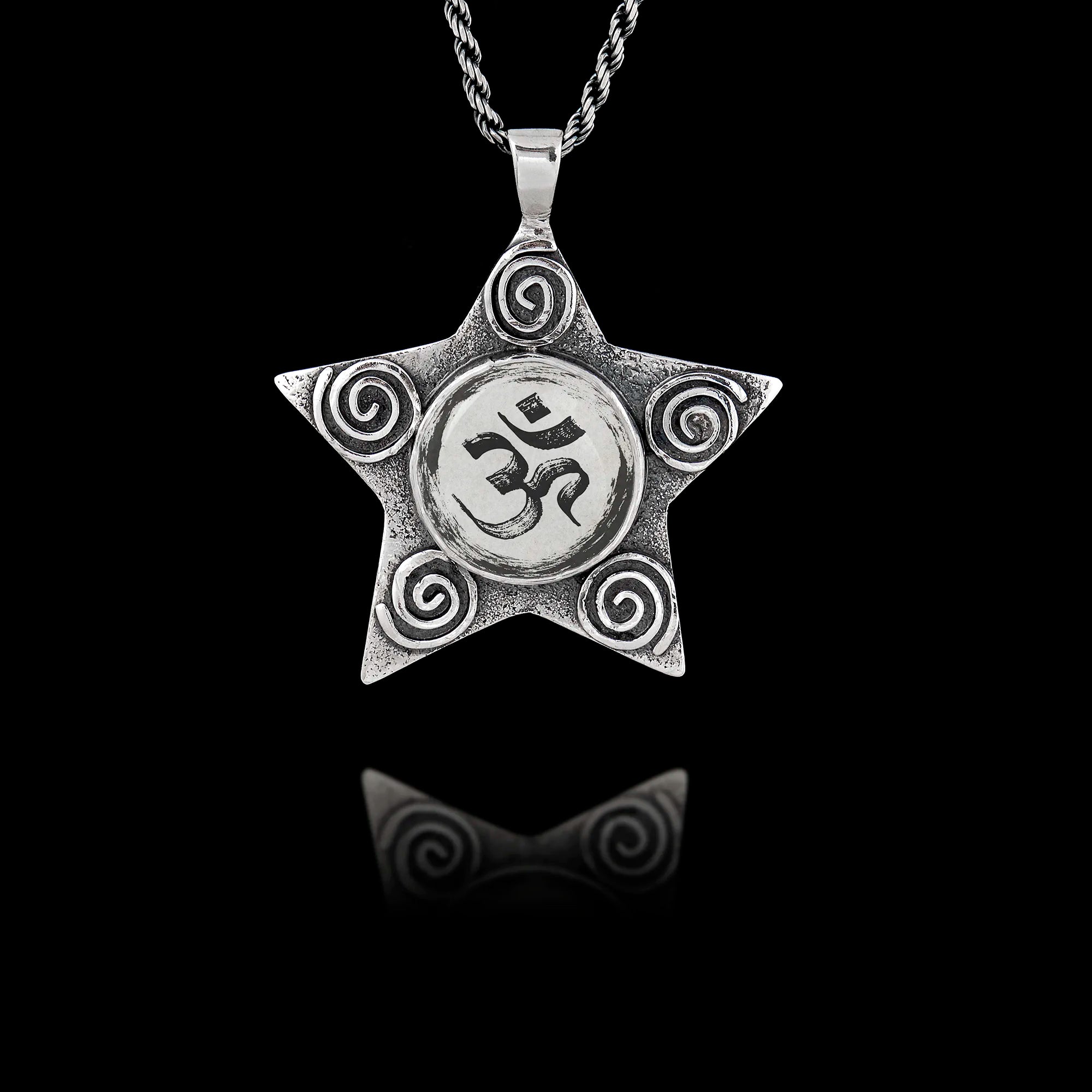 925 sterling silver five-pointed star pendant with spiral details featuring a round ceramic insert with the Sanskrit Om symbol.