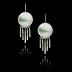 Pair of 925 sterling silver drop earrings featuring a 25mm round ceramic insert with a misty green abstract landscape and a fringe of textured silver bars.
