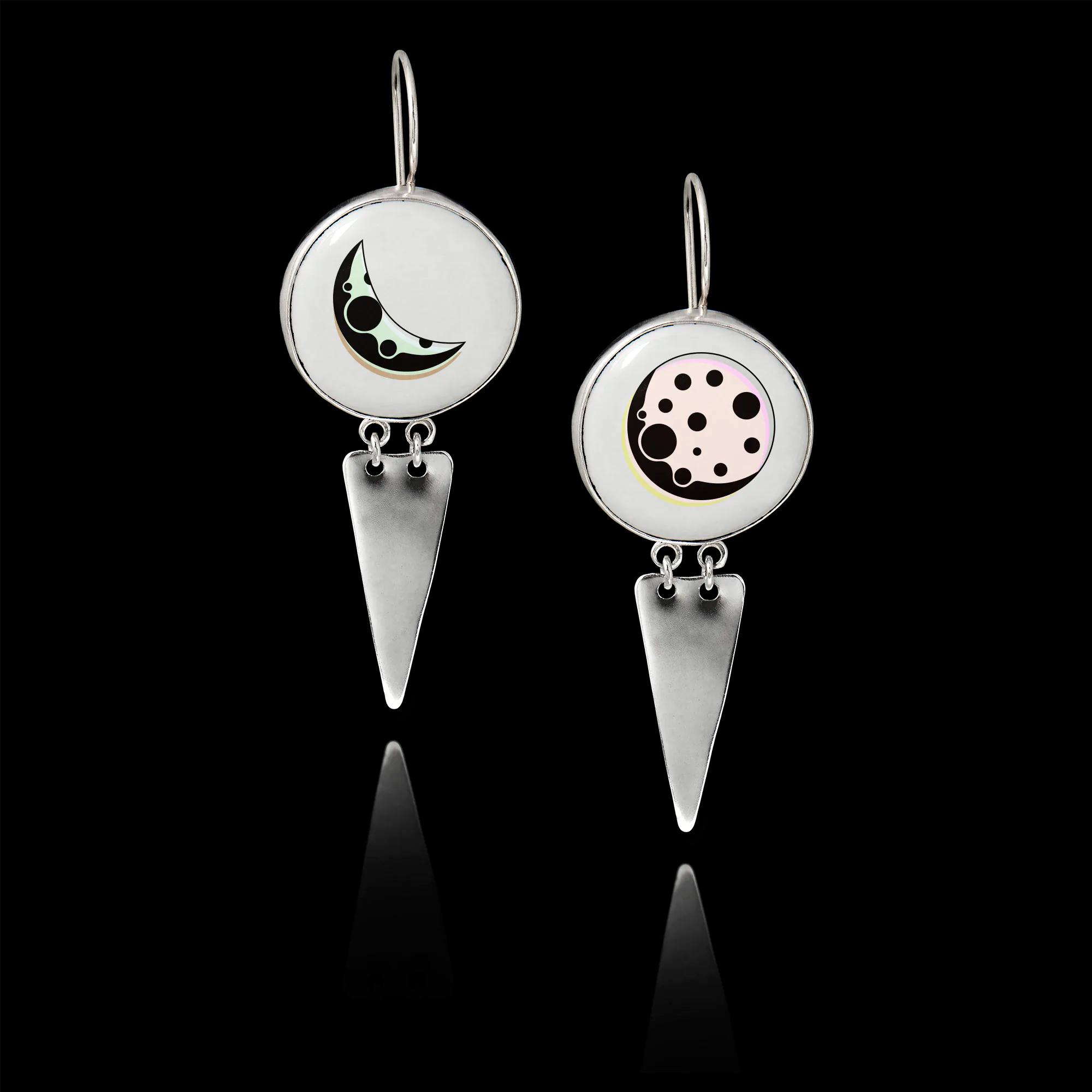 Pair of 925 sterling silver drop earrings featuring 25mm round ceramic inserts with stylized crescent and full moon designs, finished with triangular silver dangles. Main image