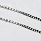 Close-up detail of sterling silver wedding crowns featuring three polished round wires in a minimalist design.